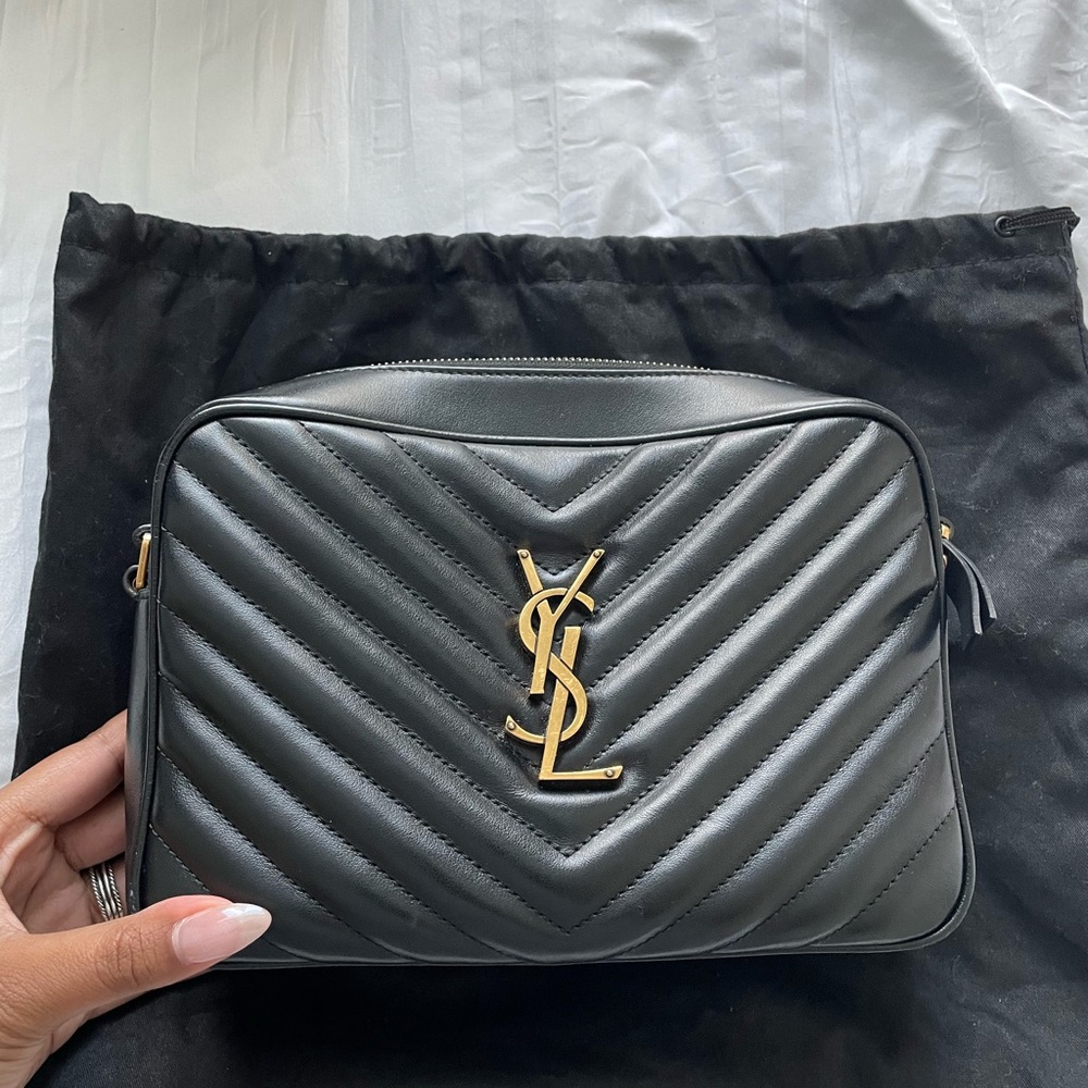 Authentic YSL Black leather camera bag. With dust bag, box and receipt included